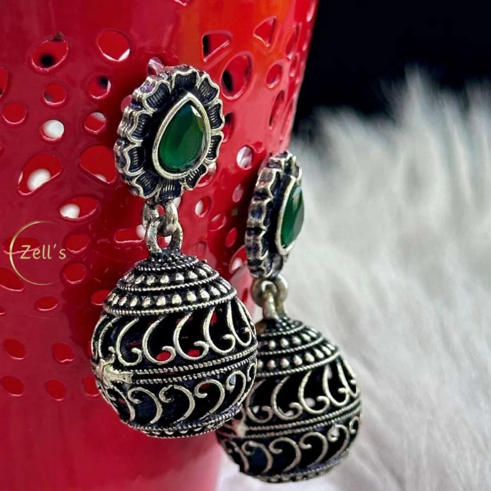 Zell’s Antique Dome Jhumka Earrings – Oxidised Silver with Green Accent